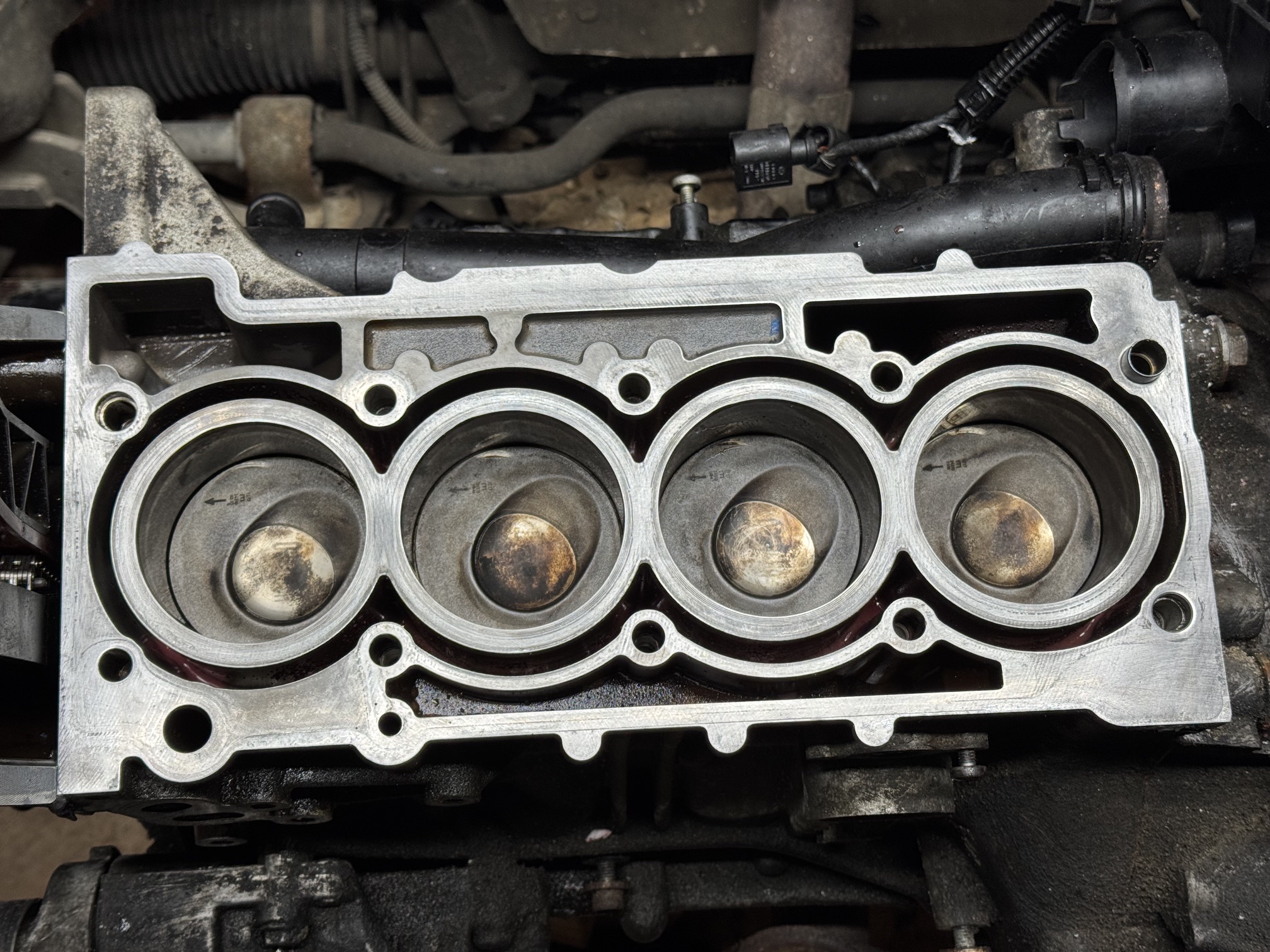 Block and piston tops cleaned