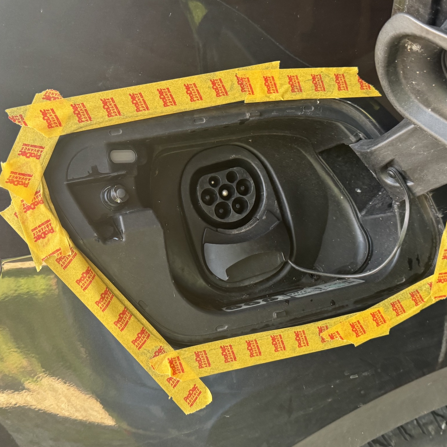 Surrounding paintwork masked to prevent damage